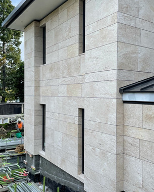 Proyecto de fachada de mármol beige Ekachai en Nueva Zelanda